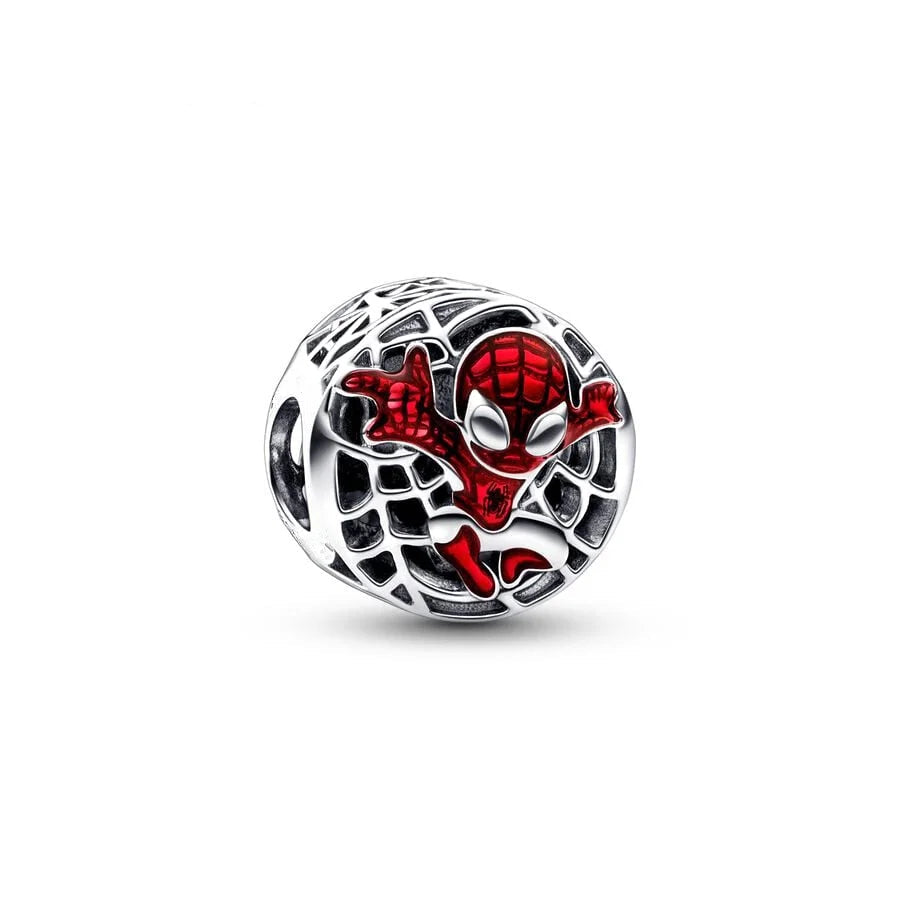 Silver charm with red and black design on a white background.